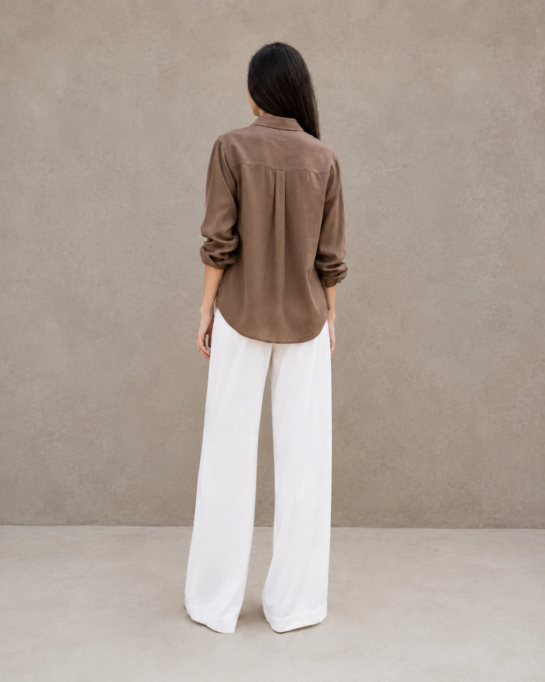 Back view of a brown lyocell-linen cardigan-style shirt with long sleeves.