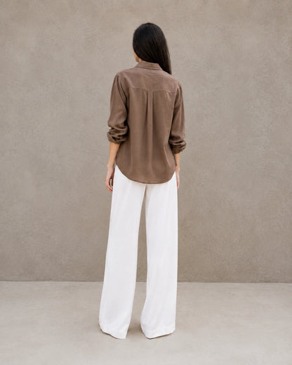 Back view of a brown lyocell-linen cardigan-style shirt with long sleeves.