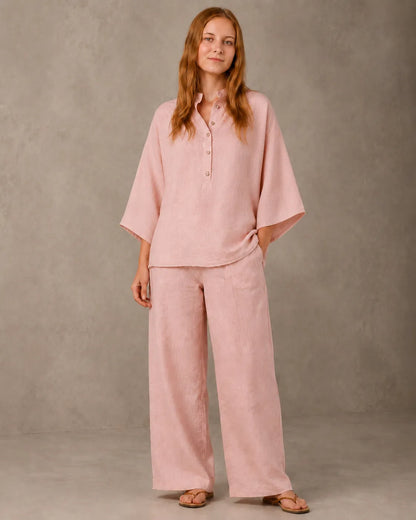 A closer front view of a model wearing the lotus pink cotton-linen co-ord set, showing the shirt's button placket and collar.
