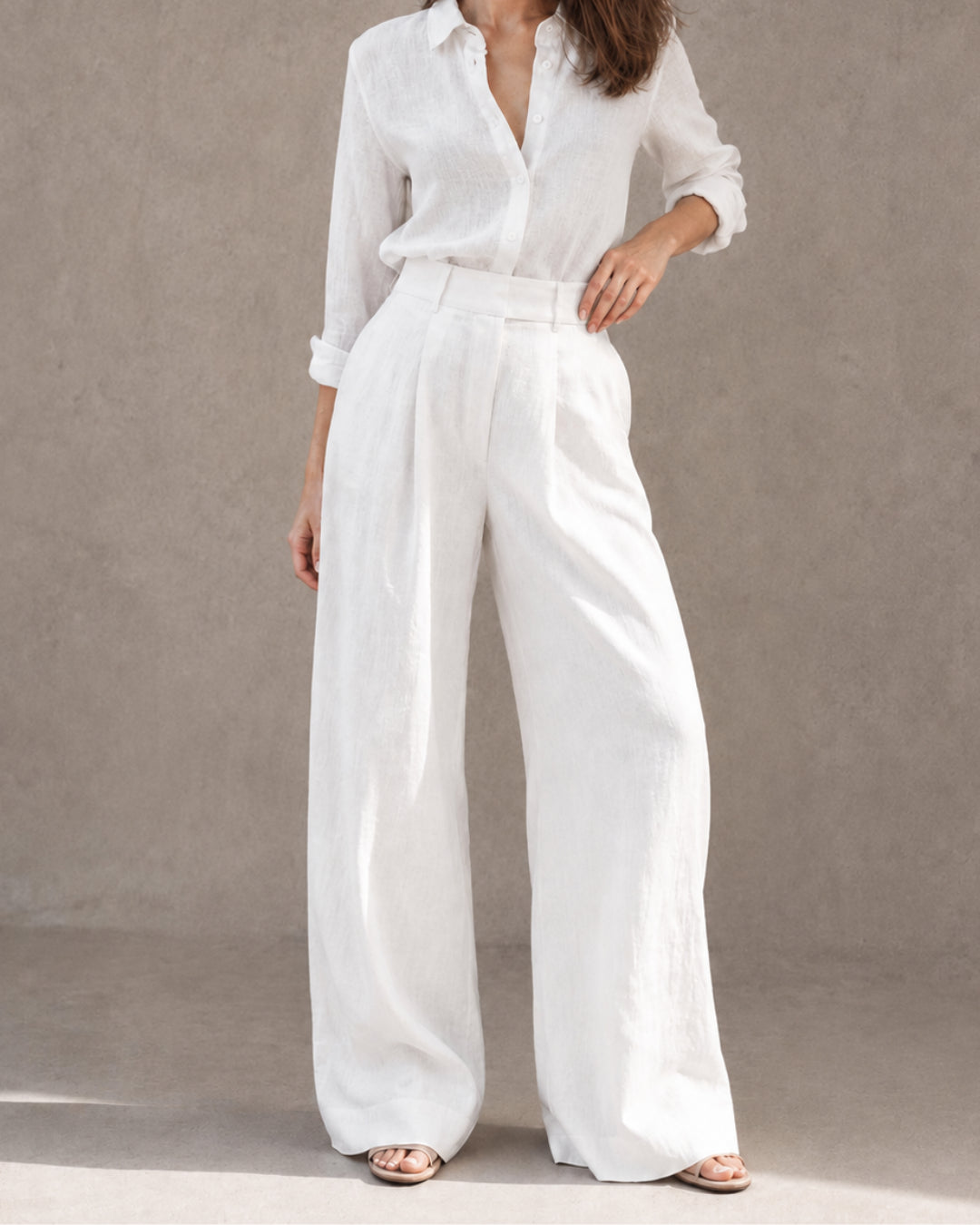 Elegant woman wears a minimalist two-piece set inspired by contemporary European fashion, designed for a timeless capsule wardrobe with versatile and refined everyday looks.