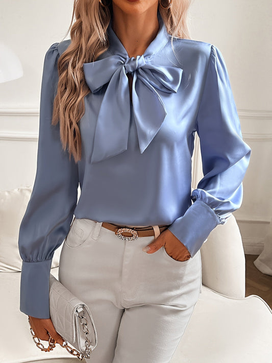 Damesblouse met strikhals en pofmouwen