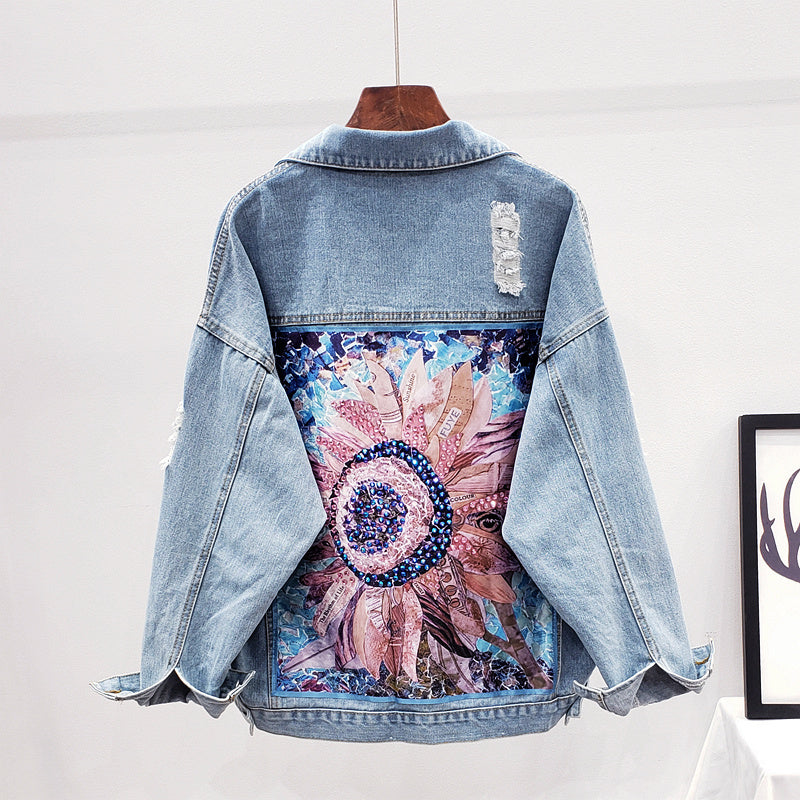 Dames spijkerjack met knoopsluiting en rugprint