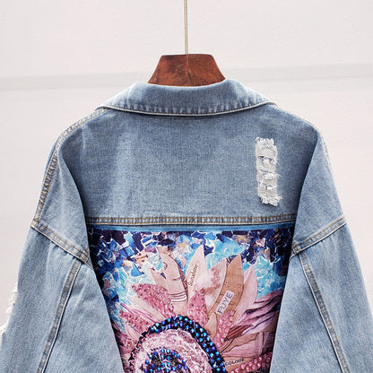 Dames spijkerjack met knoopsluiting en rugprint